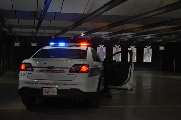 Police vehicle inside firing range